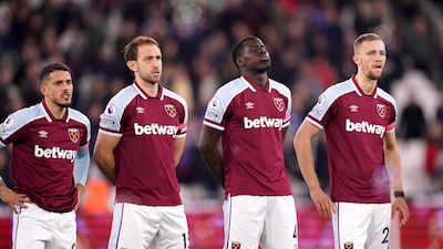 Kurt Zouma lines up alongside his West Ham teammates ahead of the Premier League game against Watford. PA