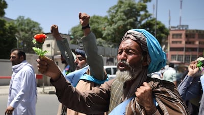 An Afghan peace activist arriving in Kabul on June 18 after marching from hundreds of kilometres from Helmand province, shouts a slogan demanding an end to the war. Wakil Kohsar / AFP Photo