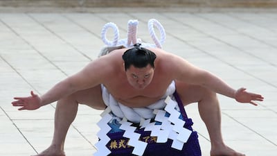 (FILES) This picture taken on January 8, 2019 shows "Yokozuna" or sumo grand champion Hakuho of Mongolia taking part in a traditional ring-entering ceremony at Meiji shrine in Tokyo. - Sumo will struggle to fill the "void" left by the retirement of its greatest-ever champion Hakuho, experts say, with few new stars emerging and public interest in the ancient Japanese sport likely to wane. (Photo by TOSHIFUMI KITAMURA / AFP)