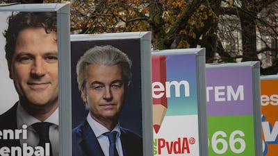 Mr Wilders on an election campaign poster near the Dutch parliament building in The Hague this month. Getty Images