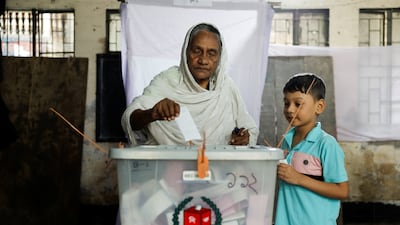 A woman casts her vote at a polling station in Dhaka, Bangladesh. Reuters