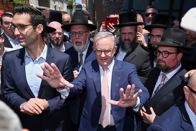 Australian Prime Minister Anthony Albanese leaves the Adass Israel Synagogue in Melbourne after a firebombing in December. AP