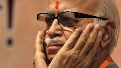 FILE ñ In this May 24, 2012 file photo, Indiaís opposition Bharatiya Janata Party (BJP) senior leader Lal Krishna Advani gestures during the party's national executive meeting in Mumbai, India. Advani, a founding member of the rightwing BJP resigned from all party positions on June, 10, 2013, a day after the party appointed a controversial Hindu ideologue to lead its campaign in national elections next year. (AP Photo/ Rajanish Kakade, File) *** Local Caption *** India Politics.JPEG-03511.jpg