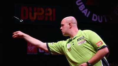 Michael Van Gerwen of the Netherlands in action at the 2015 Dubai Duty Free Darts Masters. Francois Nel / Getty Images