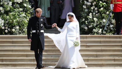Prince Harry, Duke of Sussex and The Duchess of Sussex leave St George's Chapel, Windsor Castle after their wedding ceremony on May 19, 2018 in Windsor, England