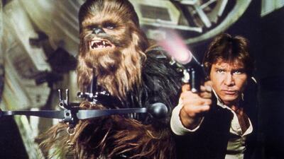 A scene showing Han Solo, played by Harrison Ford, firing upon Stormtroopers as Princess Leia (Carrie Fisher) races to board the Millennium Falcon inside the Death Star battle station in Star Wars: A New Hope. Lucasfilm Ltd