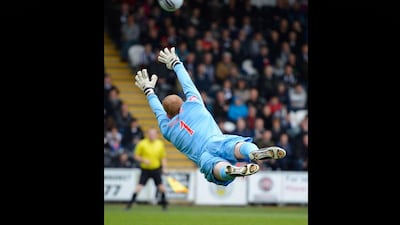 St. Mirren's goalkeeper Craig Samson fails to stop Celtic's Victor Wanyama's second goal during their match at the St. Mirren Stadium in Paisley. Russell Cheyne / Reuters
