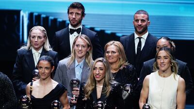 Alex Greenwood, Aitana Bonmai, Ruben Dias, Kiera Walsh, Olga Carmona, Sarina, Kyle Walker, Lauren James and Lucy Bronze on stage with their trophies. PA