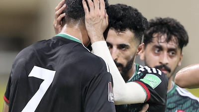 The UAE's Ali Mabkhout celebrates with teammates after scoring his side's opener against Indonesia. Chris Whiteoak / The National.