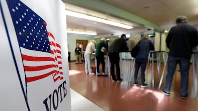 Voters cast their ballots in Gates Mills, Ohio. AP Photo