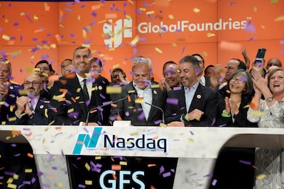 Celebrating with employees the debut of GlobalFoundries shares trading on the Nasdaq in New York on Thursday are chief executive Thomas Caulfield, front centre, with Mubadala Investment Company chief executive Khaldoon Al Mubarak, to his right, and to his left, Ahmed Al Idrissi, chief executive of direct investments at Mubadala and chairman of GlobalFoundries. Waleed Al Muhairi, Mubadala deputy group chief executive, is to Mr Al Mubarak's right. Photo: Mubadala