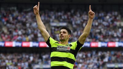 Christopher Schindler of Huddersfield Town celebrates scoring the winning penalty in the penalty shoot out after the Championship play-off final against Reading at Wembley Stadium on May 29, 2017 in London, England. Getty Images