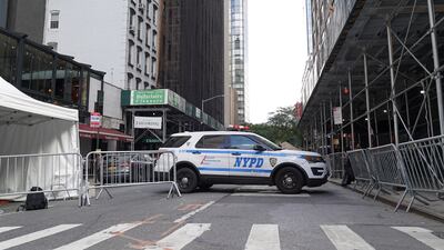 An NYPD SUV blocks a street in Midtown Manhattan. Willy Lowry / The National