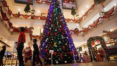Kenya: A 60 feet (about 18 metres) high Christmas tree stands inside Kenya's largest shopping mall TRM in Nairobi, Kenya. EPA/Daniel Irungu