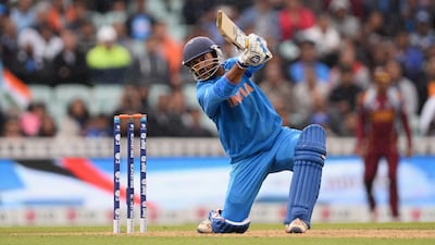 Karthik, who has reinvented himself as a stoke-making middle-order batsman, proved why is ideal for the important No 4 position. He scored a fifty, providing ample support to Dhawan. Mike Hewitt / Getty Images