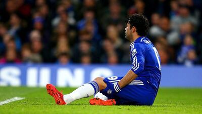 Diego Costa clutches his hamstring 10 minutes after coming on as a substitute during Chelsea's victory over Stoke Ian Walton / Getty