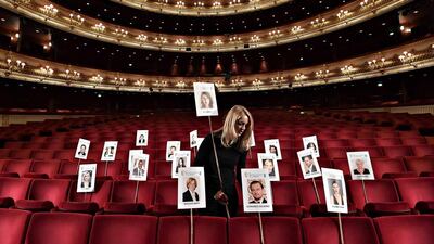 An event employee positions place sticks for guests for Sunday’s British Academy of Film and Television Awards (Bafta) ceremony at the Royal Opera House in central London. Toby Melville / Reuters