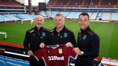 John Terry, right, alongside Aston Villa manager Dean Smith, centre, and fellow assistant manager Richard O'Kelly. Reuters