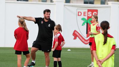 A Go-Pro Academy coach leads the training session at the Dubai English Speaking College. Pawan Singh / The National