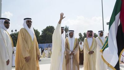 From left to right Sheikh Mohammed bin Hamad Al Sharqi, Crown Prince of Fujairah, Sheikh Sultan bin Mohammed Al Qasimi, Crown Prince of Sharjah, General Sheikh Mohammed bin Zayed, Crown Prince of Abu Dhabi and Deputy Supreme Commander of the UAE Armed Forces, Sheikh Abdullah bin Zayed, Minister of Foreign Affairs, Sheikh Hamdan bin Mohammed, Crown Prince of Dubai, Sheikh Ammar bin Humaid Al Nuaimi, Crown Prince of Ajman and Sheikh Rashid bin Saud bin Rashid Al Mualla, Crown Prince of Umm Al Quwain attend the flag raising ceremony in celebration of the UAEís 43rd National Day, at the Breakwater in Abu Dhabi. Ryan Carter / Crown Prince Court - Abu Dhabi