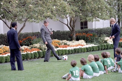 Pele played the beautiful game with Ronald Reagan and Steve Moyers in the Rose Garden during another visit to the White House in 1982. Photo: National Archives