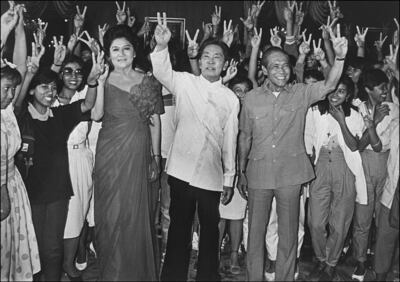 Former Philippines president Ferdinand Marcos, centre, ruled with an iron grip between 1972 and 1986. AFP