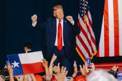 US President Donald Trump dances during a campaign event at the Freeman Coliseum in San Antonio, Texas, on October 7. Bloomberg