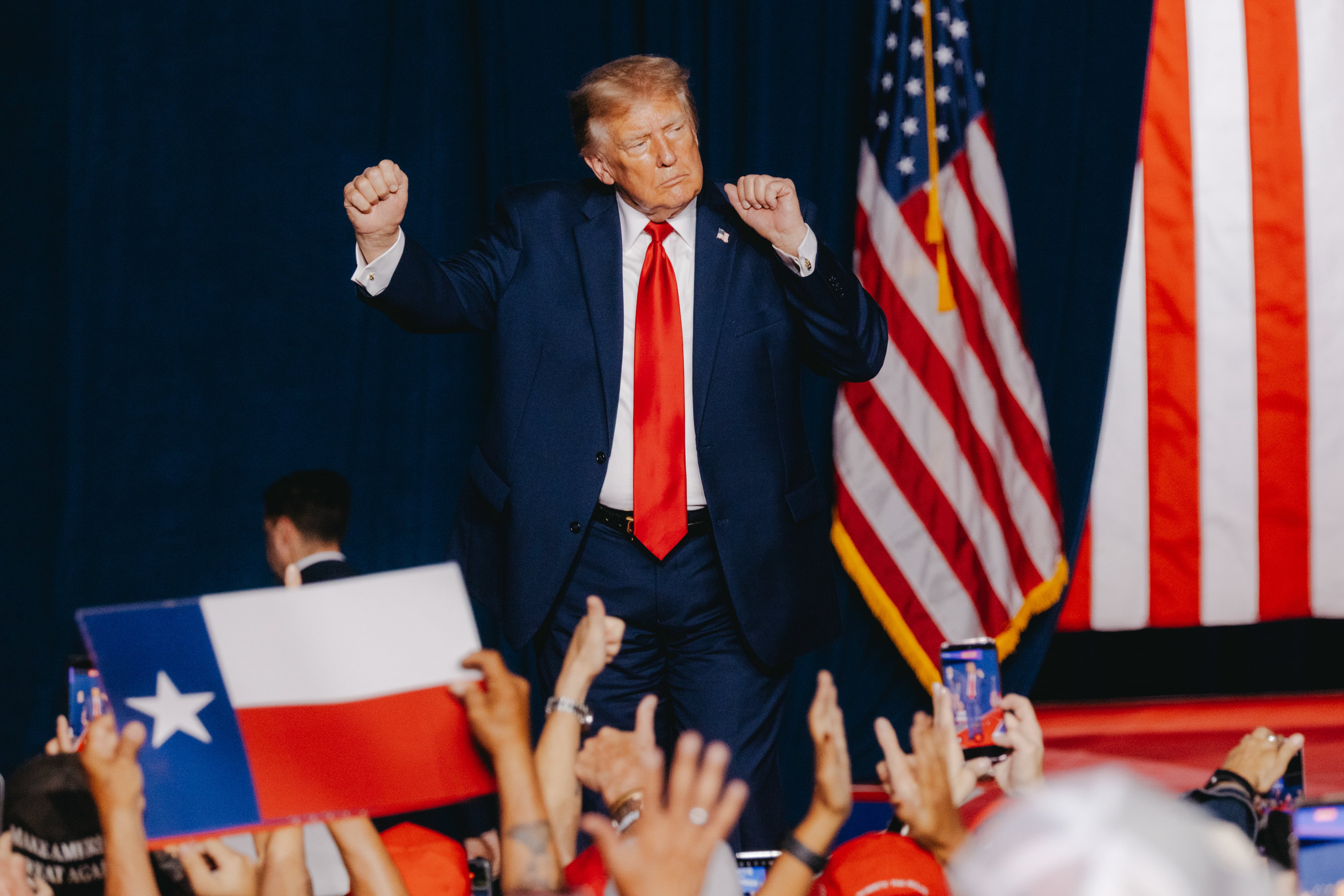 US President Donald Trump dances during a campaign event at the Freeman Coliseum in San Antonio, Texas, on October 7. Bloomberg