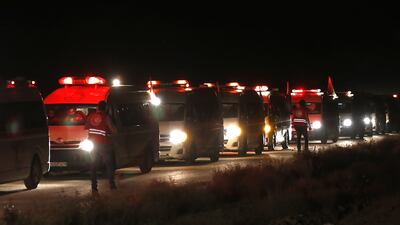 Buses transport members of ISIL to Deir Ezzor under part of a deal brokered by Syria and Lebanon to end three years of jihadist presence in the area. AFP Photo