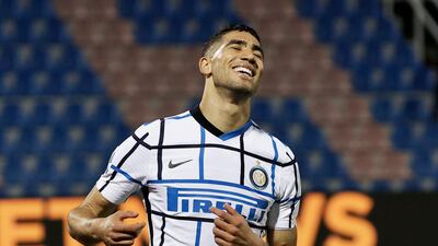Achraf Hakimi celebrates his injury-time goal at Crotone. Reuters