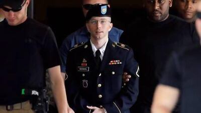 Manning is escorted out of a Fort Meade courthouse during the sentencing phase of his court-martial for leaking military and diplomatic secrets.
