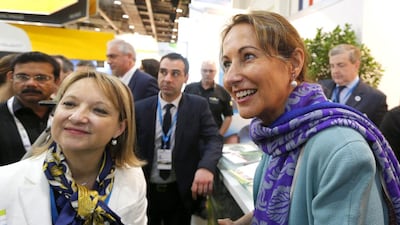 French ecology minister Segolene Royal, right, with other delegates at the opening of the World Future Energy Summit. Karim Sahib / AFP
