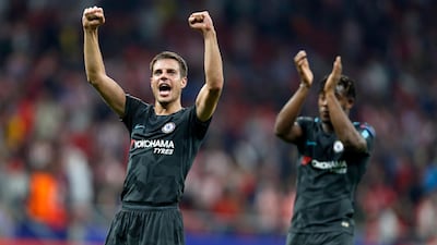 Chelsea's Cesar Azpilicueta and Chelsea's last minute scorer Michy Batshuayi celebrate after the match. Francisco Seco / AP Photo