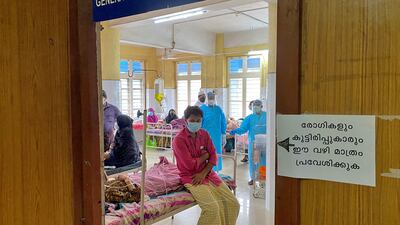 A man looks out from a coronavirus disease ward in the Government Medical College Hospital in Manjeri, Kerala, India. Reuters