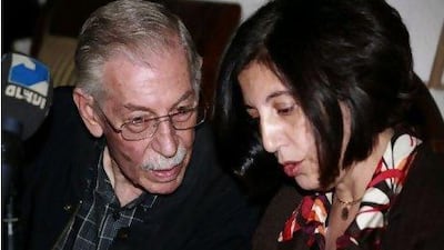Syrian opposition figures Hussein Al Oudat (left) and Nada Al Khish (right) speak during a meeting held by the Popular Front for Change and Liberation some 30 kilometres from Damascus yesterday. YOUSSEF BADAWI / EPA