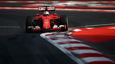Sebastian Vettel of Germany and Ferrari drives during the Formula One Grand Prix of Mexico at Autodromo Hermanos Rodriguez on November 1, 2015 in Mexico City, Mexico. Clive Mason/Getty Images/AFP