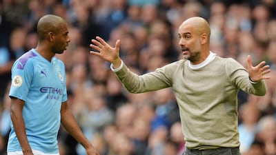 epa07901487 Manchester City manager Pep Guardiola (R) talks to player Fernandinho during the English Premier League soccer match between Manchester City and Wolverhampton Wanderers at the Etihad Stadium, Manchester, Britain, 06 October 2019. EPA/PETER POWELL EDITORIAL USE ONLY. No use with unauthorized audio, video, data, fixture lists, club/league logos or 'live' services. Online in-match use limited to 120 images, no video emulation. No use in betting, games or single club/league/player publications