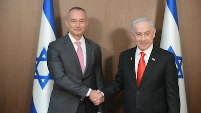 Israel's Prime Minister Benjamin Netanyahu greets Bulgarian diplomat Nickolay Mladenov, who wlll effectively run the executive board overseeing Gaza, in Jerusalem. Photo: Government Press Office