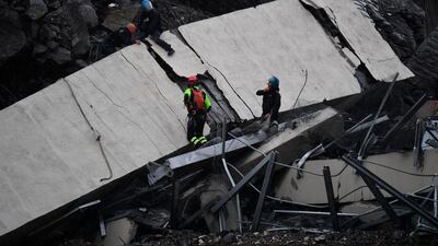 Rescues work among the debris. ANSA via AP