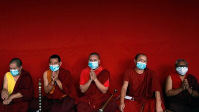 Buddhist monks offer prayer during the funeral procession of Ang Rita Sherpa also known as the "snow leopard" for his climbing skills, who climbed Everest 10 times without the use of supplement oxygen, in Kathmandu, Nepal. Reuters
