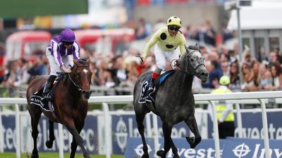 Defoe right, ridden by Andrea Atzeni wins the Coronation Cup. Reuters