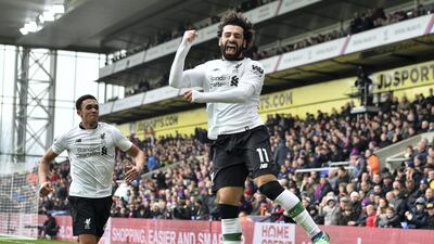 Mohamed Salah celebrates scoring Liverpool's second goal during the English Premier League football match against Crystal Palace at Selhurst Park on March 31, 2018. Glyn Kirk / AFP