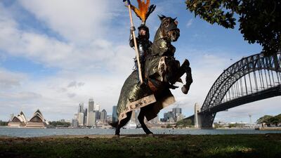 Australian Rod Walker, two time world medieval jousting champion, poses with his horse Crusader. Dan Himbrechts / EPA