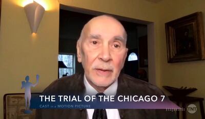 Frank Langella, who plays Julius Hoffman in 'The Trial of the Chicago 7', accepts the award for Outstanding Performance by a Cast in a Motion Picture during the 27th annual Sag Awards. AP