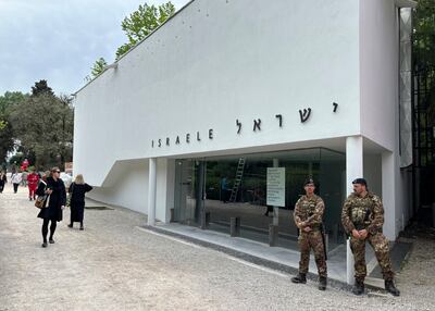 Italian soldiers are stationed outside the Israel pavilion. AP