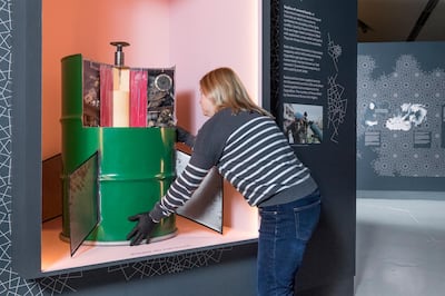 A replica barrel bomb reveals its shrapnel at the exhibition in Manchester. IWM North