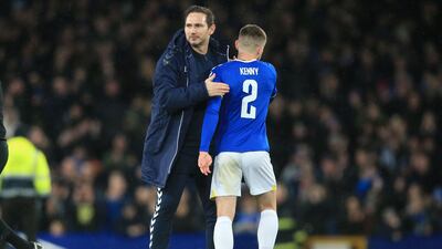 Frank Lampard congratulates Everton's midfielder Jonjoe Kenny after the FA Cup fourth round win over Brentford at Goodison Park. AFP