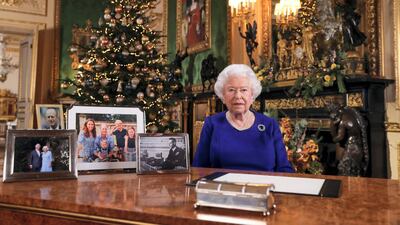 Britain's Queen Elizabeth II poses for a photograph after she recorded her annual Christmas Day message, in Windsor Castle, London. AFP
