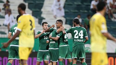 Carlos Villanueva, left, Essa Obaid, right, and their teammates to celebrate Al Shabab’s win. Ashraf Al Amra / Al Ittihad