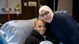 Yassin Sedhom and his mother, Lamiaa Abdelaal, at Burjeel Hospital in Sharjah, where he has received treatment for a rare and aggressive form of cancer. Ahmed Ramzan / The National